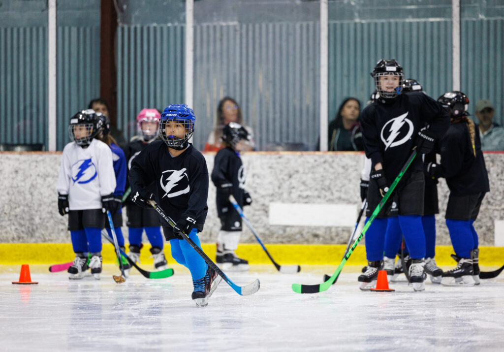 TAMPA, FL - JANUARY 29: Kids ages 5-10 participate in the Tampa Bay Lightning rookie league hockey program at Xtra Ice Power Pole on Sunday, January 29, 2023 in Tampa, Florida. Rookie League is a next steps program for young players who are preparing to participate in a local hockey league and is coached by Lightning Alumni and Staff. The Tampa Bay Lightning are committed to providing girls within Florida and the Tampa Bay Area a safe, competitive environment to grow their individual hockey skills while promoting the enjoyment, appreciation and understanding of hockey. 
(Photo by Casey Brooke Lawson/Tampa Bay Lightning)