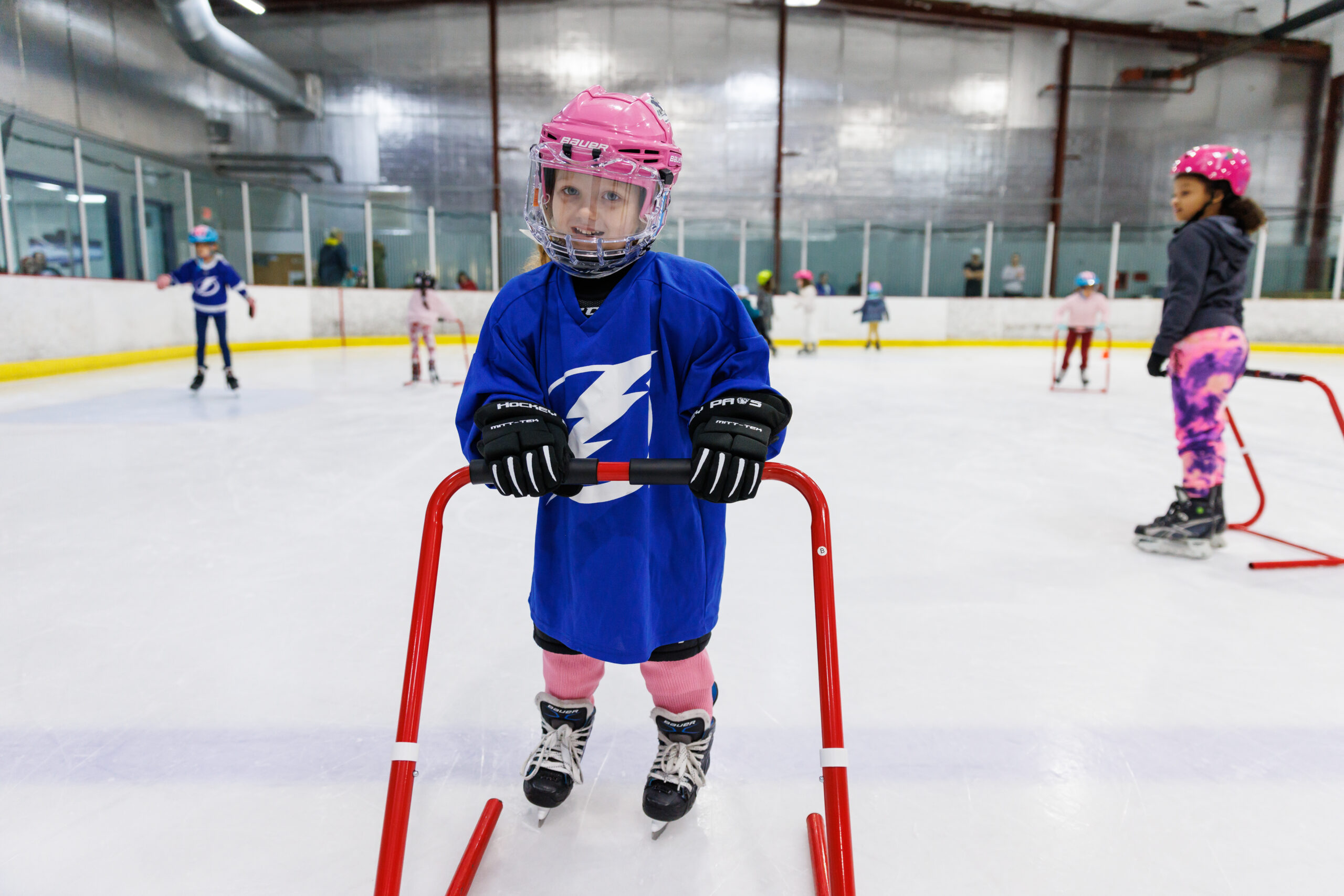 TAMPA, FL - JANUARY 29: Kids ages 5-10 participate in the Tampa Bay Lightning Learn to Skate hockey program at Xtra Ice Power Pole on Sunday, January 29, 2023 in Tampa, Florida. The Tampa Bay Lightning are committed to providing girls within Florida and the Tampa Bay Area a safe, competitive environment to grow their individual hockey skills while promoting the enjoyment, appreciation and understanding of hockey. 
(Photo by Casey Brooke Lawson/Tampa Bay Lightning)